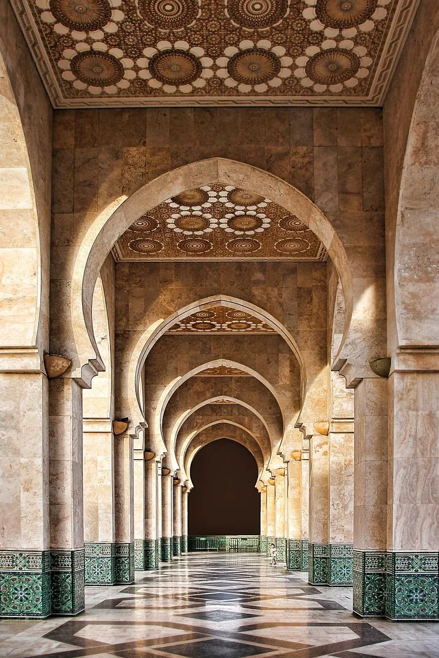 Carved arches and marble floors inside the Hassan II Mosque