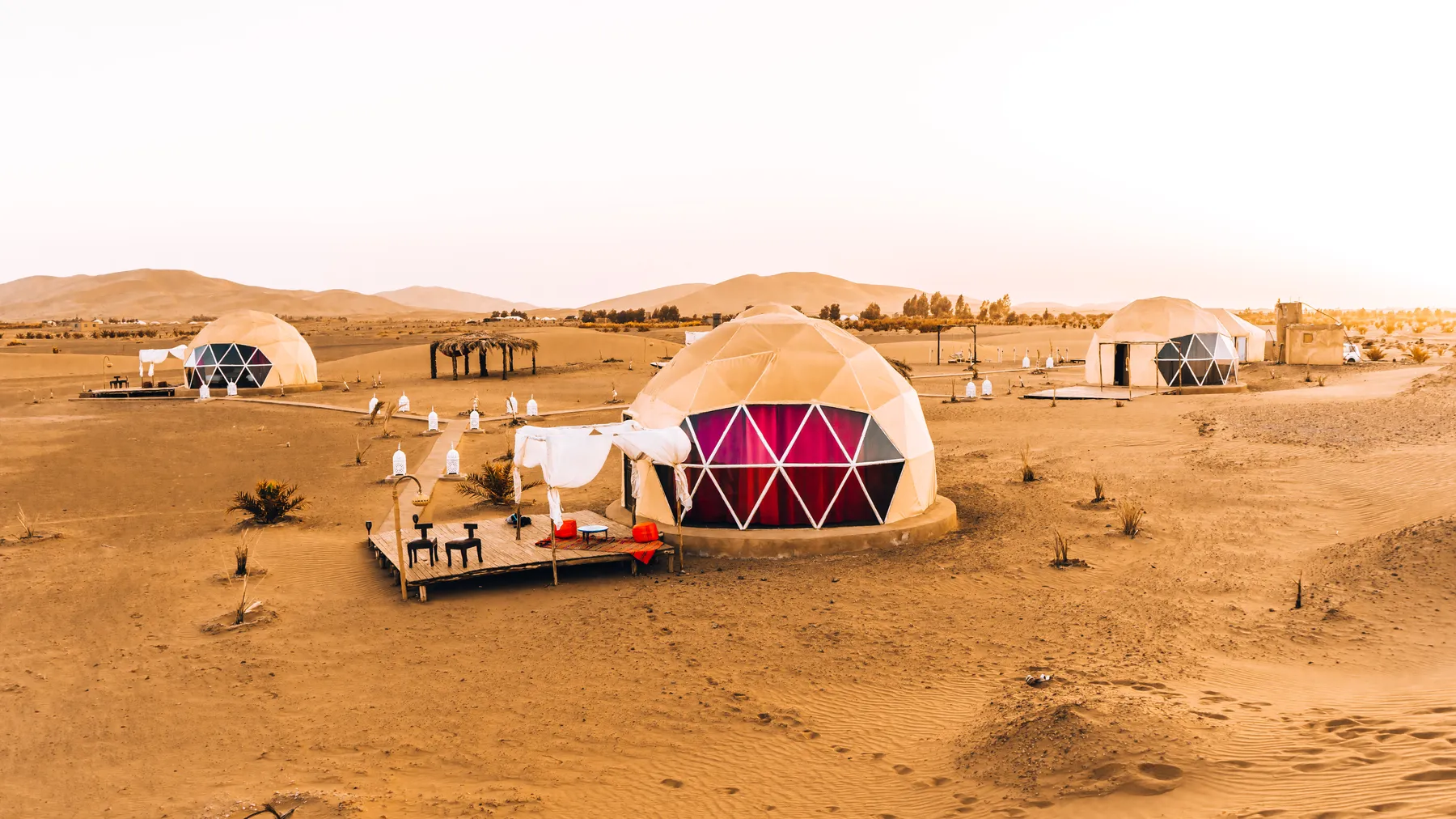 Domed luxury tents of a desert camp in the Sahara